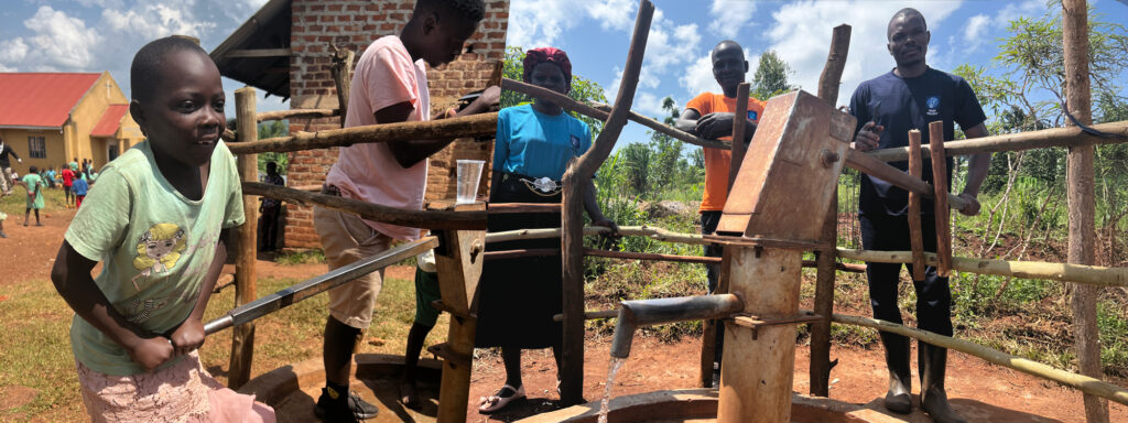 Borehole photos with a child pulling the handle for the water and the water team gathered around a borehole