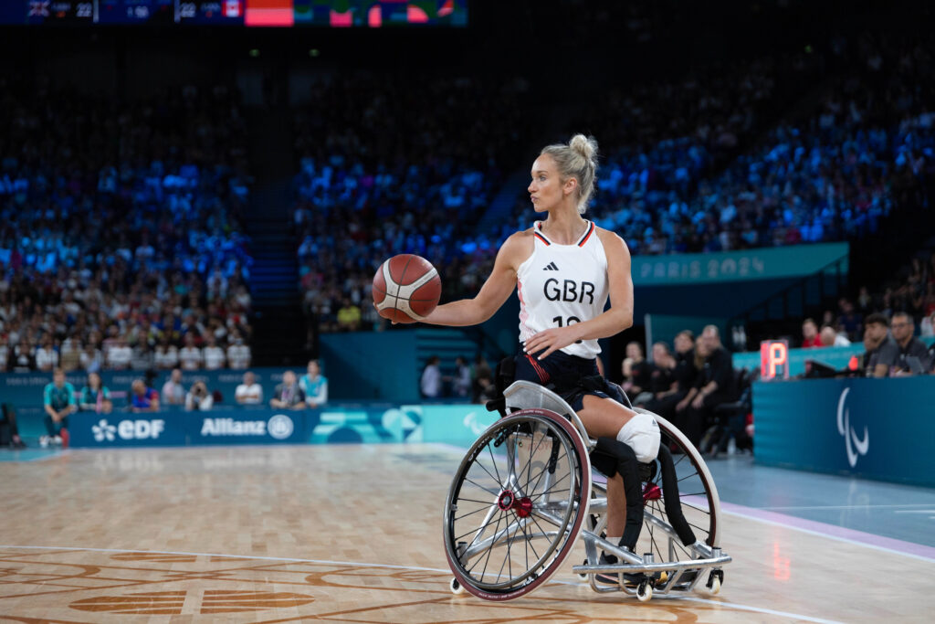 Amy Conroy pictured holding the basketball for team GB during the Paralympics