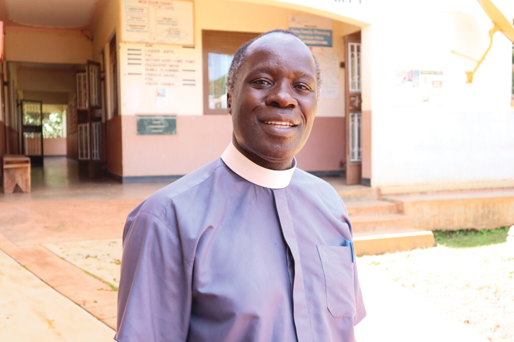 Reverend Canon Justus Miwanda pictured smiling in Uganda