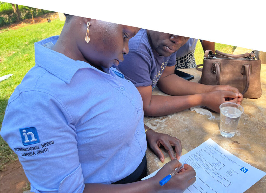 Locally led Uganda water team carrying out water tests