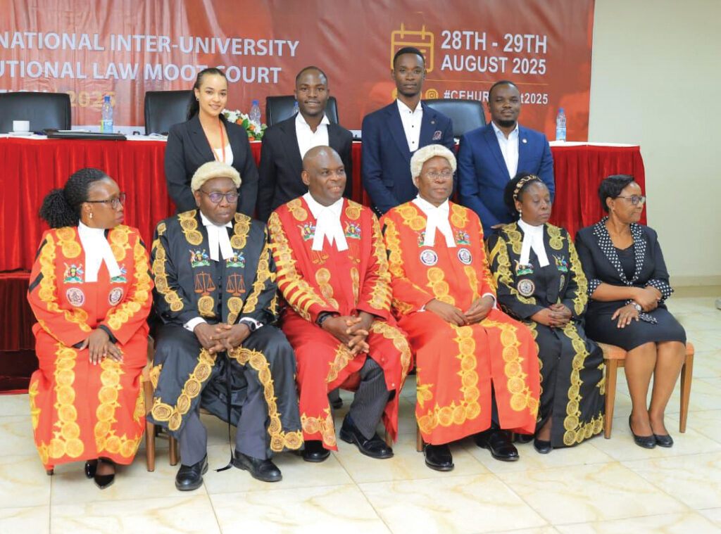 Samuel with his peers and teachers at a national inter-law school competition
