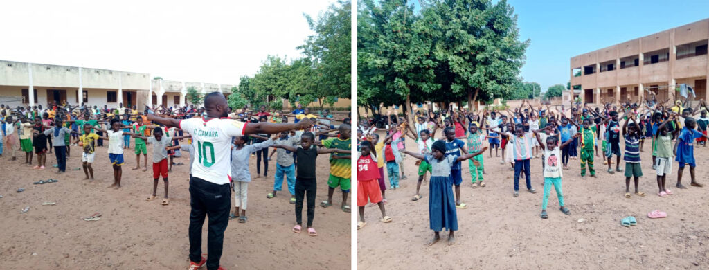Lots of students gather in the playground doing exercises - keeping in good physical health helps healing